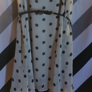Tan and black polka dot dress.